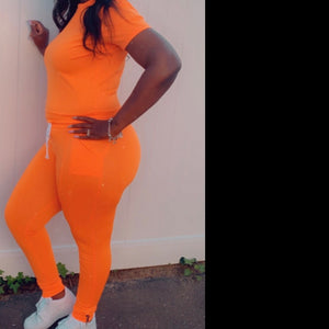 Women's 2-piece short sleeved high-waisted track suit w/ zippered leg- Orange